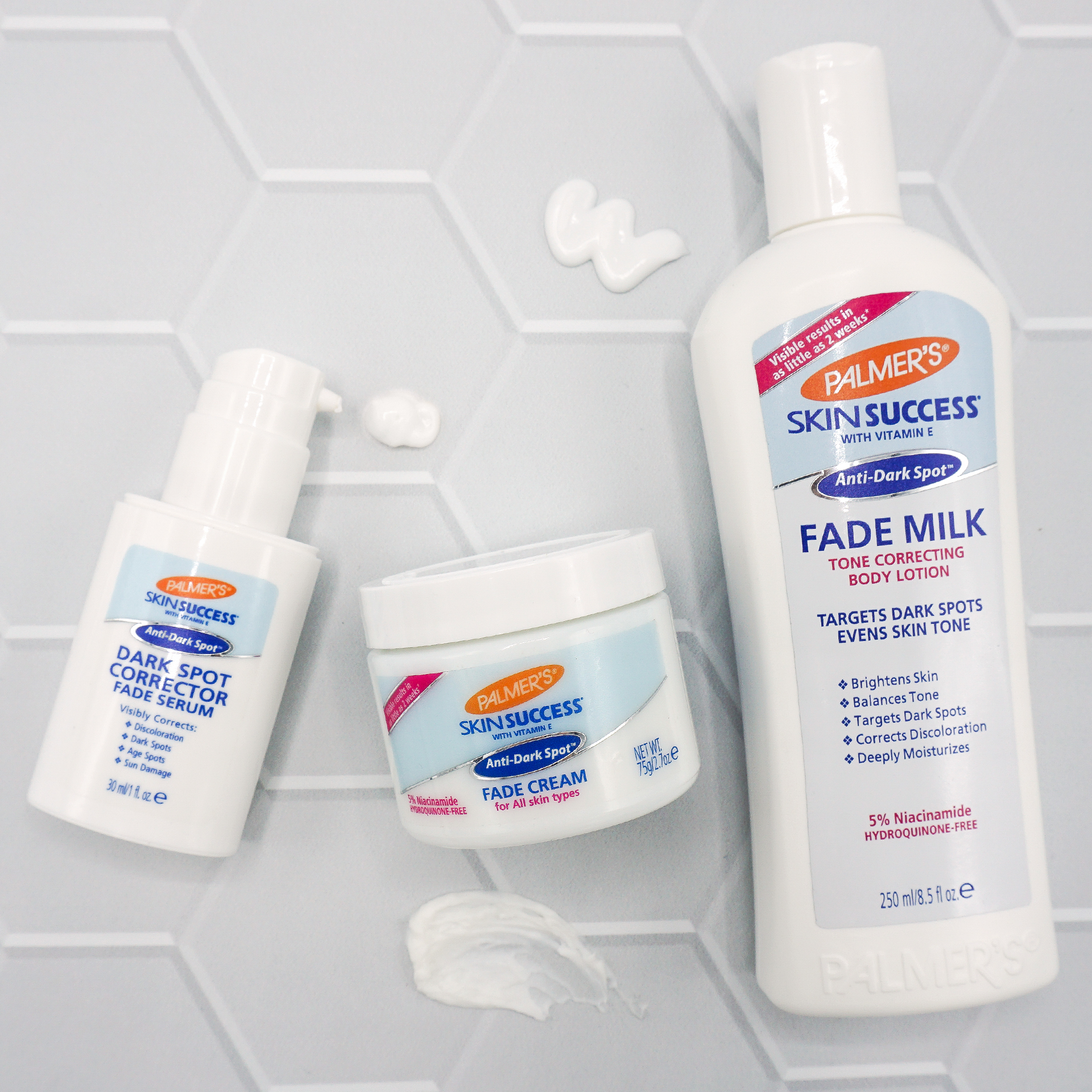 Palmer's Skin Success Fade Cream, Dark Spot Corrector and Fade Milk for glowing skin on table