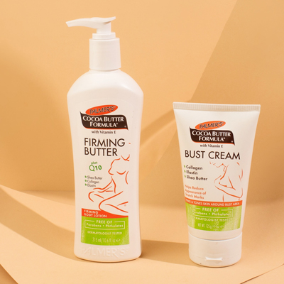 Palmer's Cocoa Butter Firming Butter and Bust Cream, the best tummy firming lotions for after pregnancy, on a piece of paper