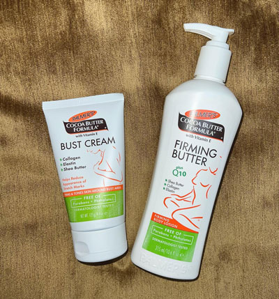 Palmer's Firming Butter and Bust Cream for how to tighten saggy skin, on a bronze blanket