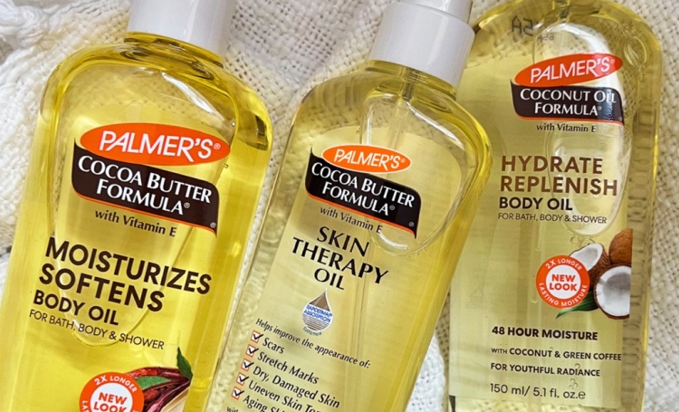 Close-up of the best body oils for glowing skin, Palmer's Body Oils, on a table 