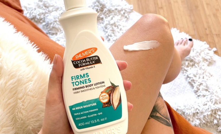 A product with many benefits of collagen and elastin in beauty products, Palmer's Cocoa Butter Formula Firming Body Lotion held in hand with lotion applied to leg.