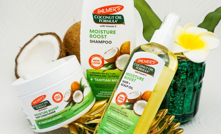 Palmer' Coconut Oil Formula Moisture Boost products for moisturizing hair in a protective style on table