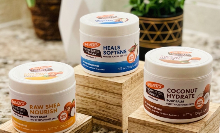 Palmer's Cocoa Butter, Coconut Oil and Shea Butter Balms for protecting skin from wind on wooden risers