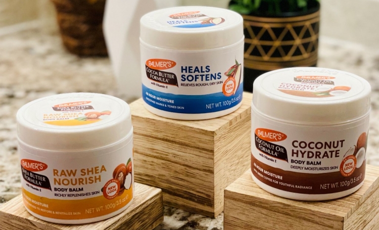 Palmer's Solid Balms for a winter skincare routine on wooden stands 